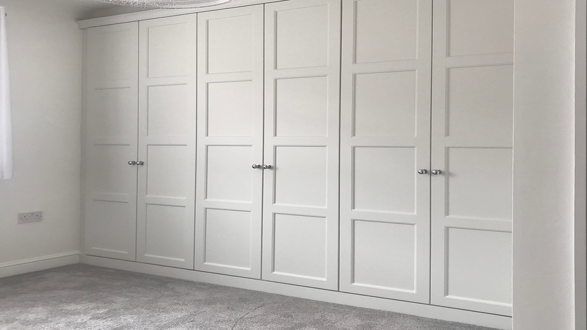 Bedroom fitted white wardrobe